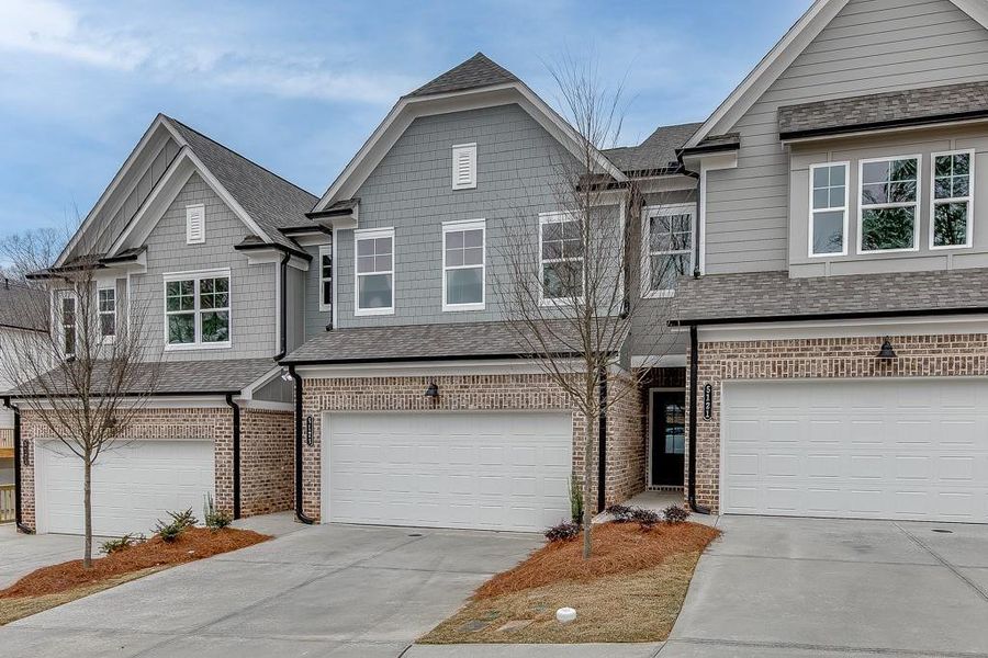 Front exterior of a new home in , Sugar Hill, GA, highlighting curb appeal (Image 1). Front exterior of a new home in , Sugar Hill, GA, highlighting curb appeal (Image 1).