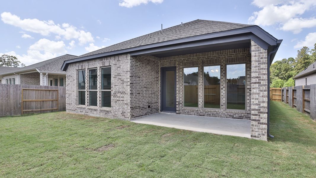 Exterior details and patio area of a home in Artavia, Conroe (Image 3). Exterior details and patio area of a home in Artavia, Conroe (Image 3).