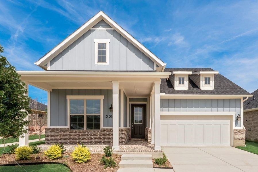 Front exterior of a new home in Bayside, Rowlett, TX, highlighting curb appeal (Image 22).