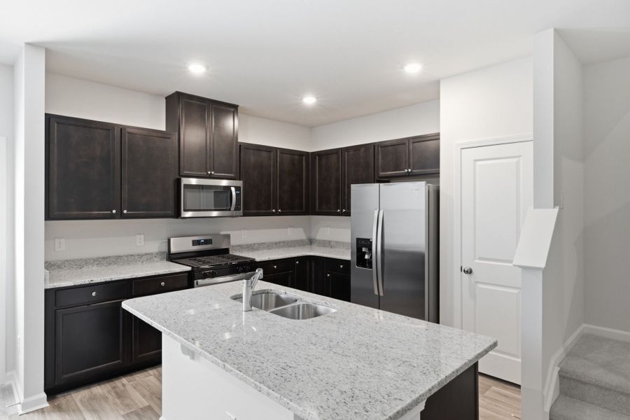 Furnished interior view inside a new home in Carpenter Falls, Durham (Image 9).
