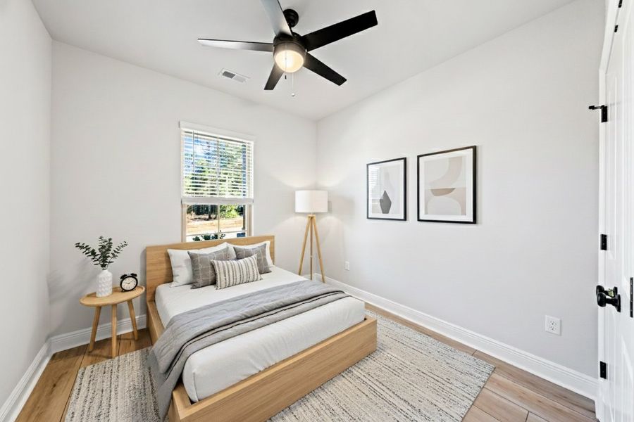 Front exterior of a new home in Young Oaks, Crestview, FL, highlighting curb appeal (Image 16).