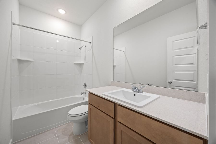 Bathroom in the Turquoise home plan by Trophy Signature Homes – REPRESENTATIVE PHOTO