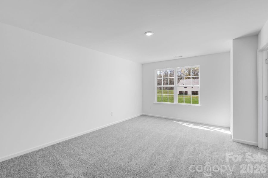 Spacious, unfurnished interior of a new home in Cannon Village, York (Image 10).