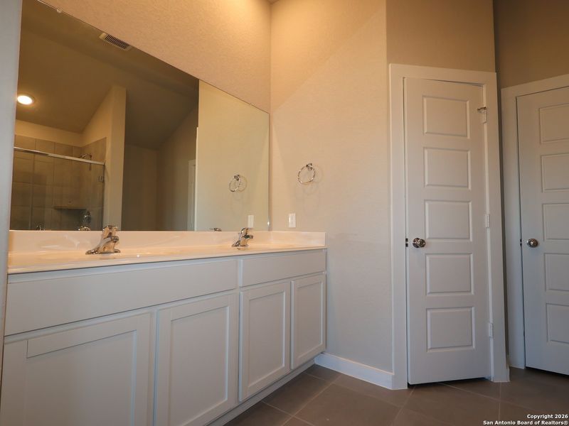Furnished interior view inside a new home in Winding Brook, San Antonio (Image 6).