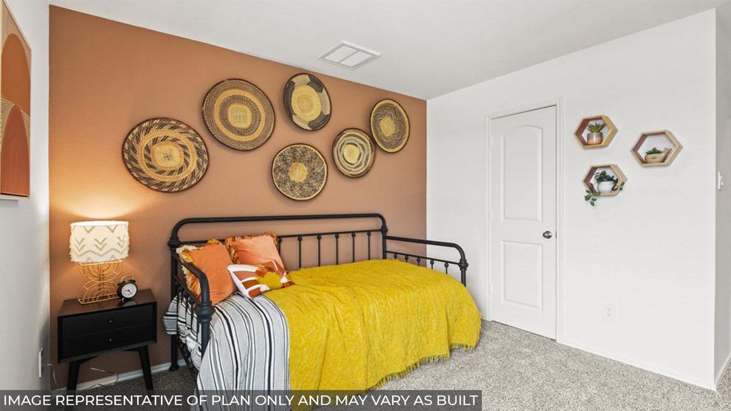 Furnished interior view inside a new home in Sunterra, Katy (Image 32).