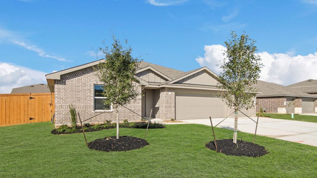 Front exterior of a new home in River Ranch Meadows, Dayton, TX, highlighting curb appeal (Image 15).