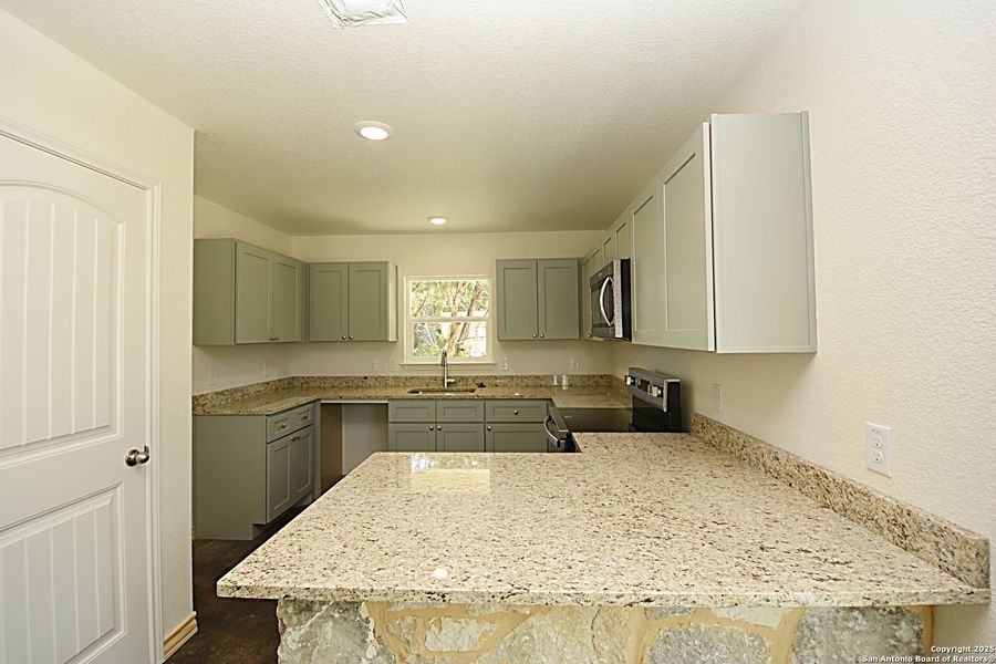 Furnished interior view inside a new home in , Spring Branch (Image 3). Furnished interior view inside a new home in , Spring Branch (Image 3).