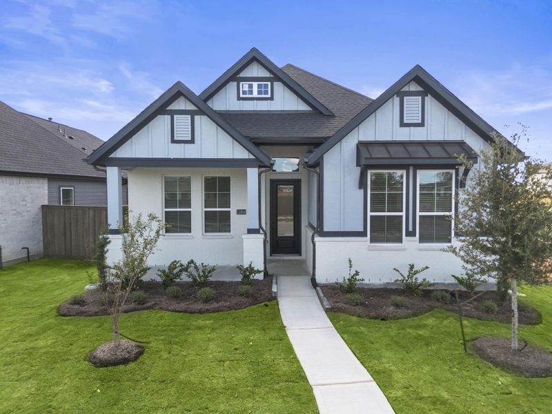 Front exterior of a new home in Riceland, Mont Belvieu, TX, highlighting curb appeal (Image 2). Front exterior of a new home in Riceland, Mont Belvieu, TX, highlighting curb appeal (Image 2).