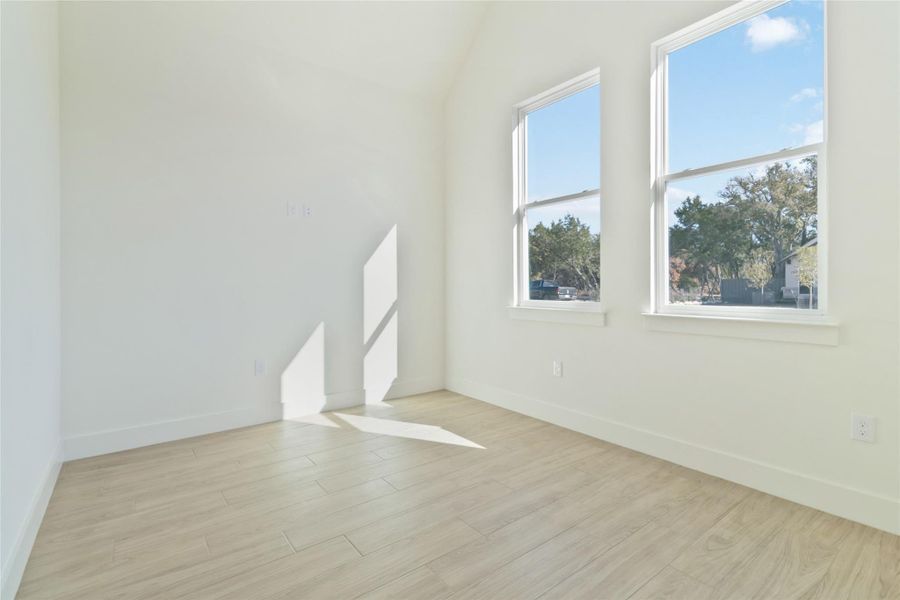 Dedicated office without virtual staging on main level with cathedral ceiling Dedicated office without virtual staging on main level with cathedral ceiling