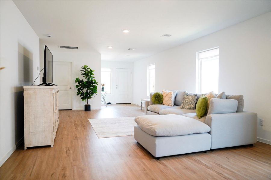 Furnished interior view inside a new home in Sunterra, Katy (Image 17).