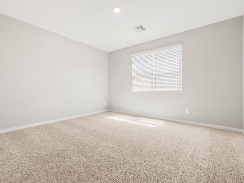 Spacious, unfurnished interior of a new home in Blossom Rock Reserve Series, Apache Junction (Image 12).