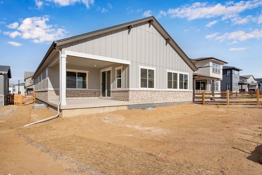Exterior details and patio area of a home in The Aurora Highlands, Aurora (Image 3).