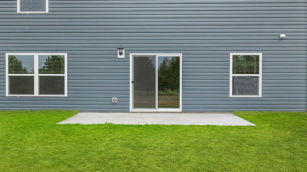 Exterior details and patio area of a home in Lakestone, Woodruff (Image 24).