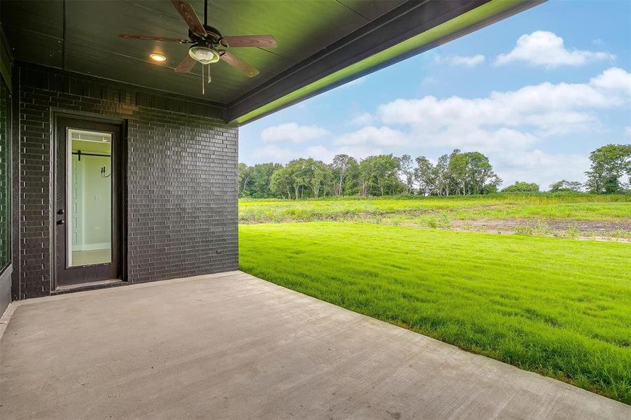 View of patio / terrace featuring ceiling fan