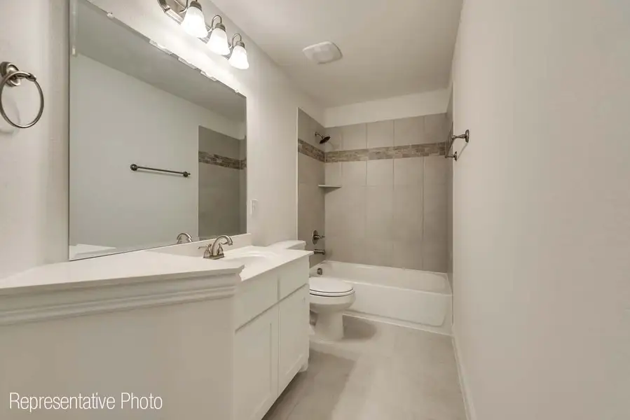 Representative furnished interior of a home built from the Charleston II by Grand Homes in Grand Oaks, Celina (Image 14).