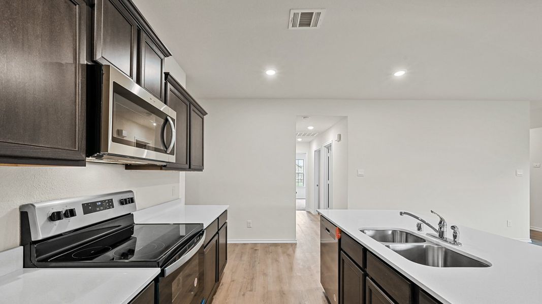 Furnished interior view inside a new home in Stonewyck Farms, Ennis (Image 6).