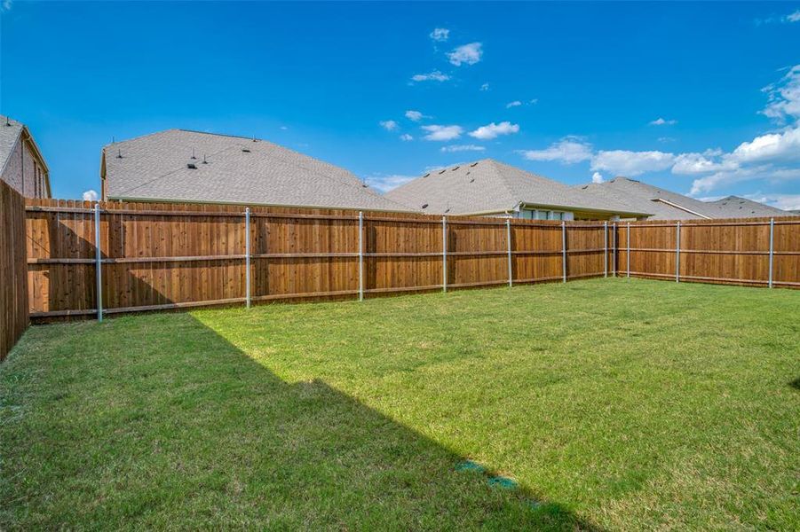 Front exterior of a new home in Bridgewater: Classic Collection, Princeton, TX, highlighting curb appeal (Image 22). Front exterior of a new home in Bridgewater: Classic Collection, Princeton, TX, highlighting curb appeal (Image 22).