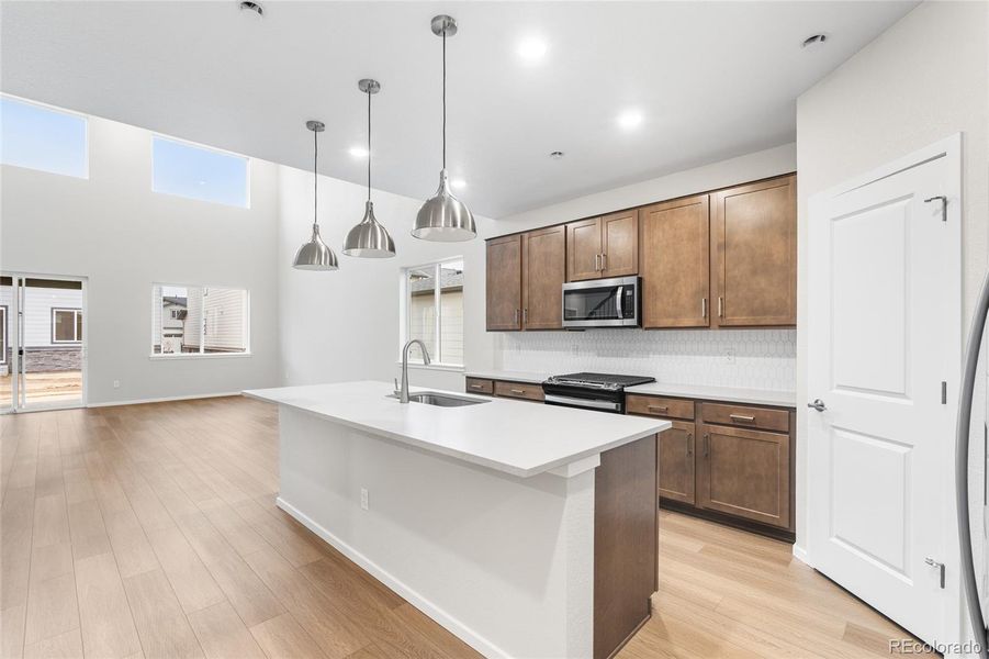 Furnished interior view inside a new home in Harvest Crossing, Aurora (Image 6).