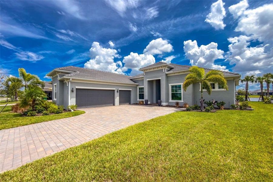 Front exterior of a new home in , Punta Gorda, FL, highlighting curb appeal (Image 26). Front exterior of a new home in , Punta Gorda, FL, highlighting curb appeal (Image 26).