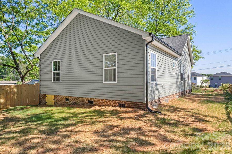Exterior details and patio area of a home in , York (Image 26).