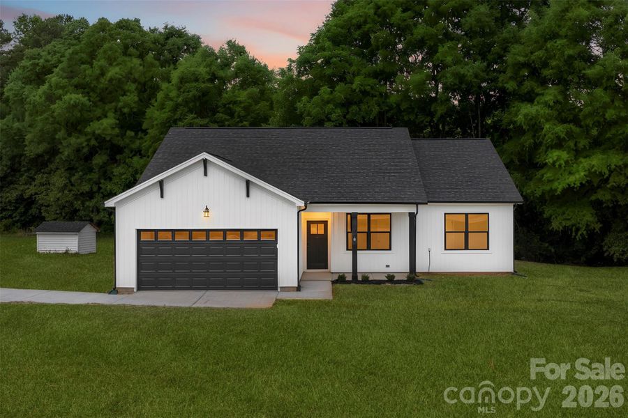 Front exterior of a new home in , Salisbury, NC, highlighting curb appeal (Image 26).