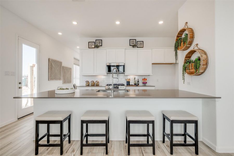 Furnished interior view inside a new home in Bridgeland, Cypress (Image 18).