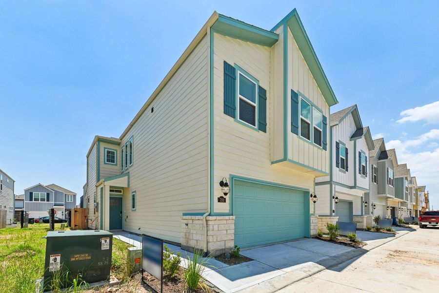 Front exterior of a new home in Kemah Crossing - City Series, Kemah, TX, highlighting curb appeal (Image 28).