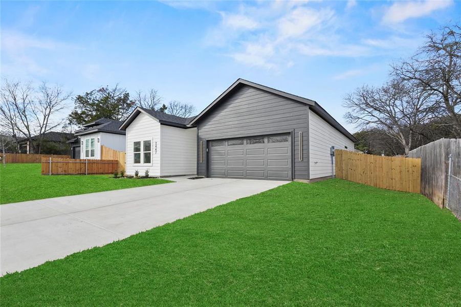 Front exterior of a new home in , Dallas, TX, highlighting curb appeal (Image 19).