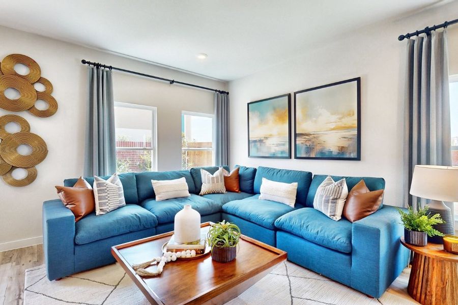 A blue couch in a room.