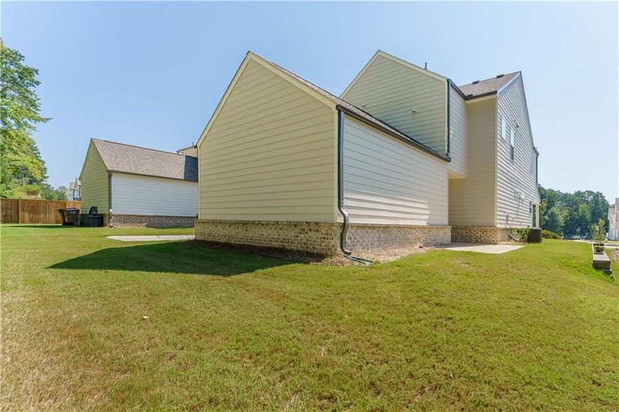 Exterior details and patio area of a home in Edenglen, Buford (Image 29).