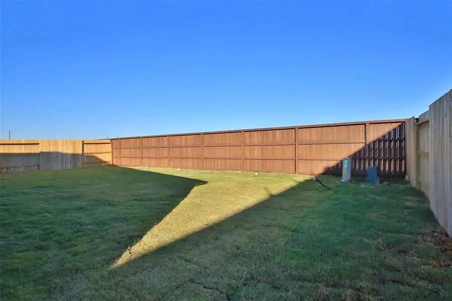 Exterior details and patio area of a home in Oakwood Estates, Waller (Image 3). Exterior details and patio area of a home in Oakwood Estates, Waller (Image 3).