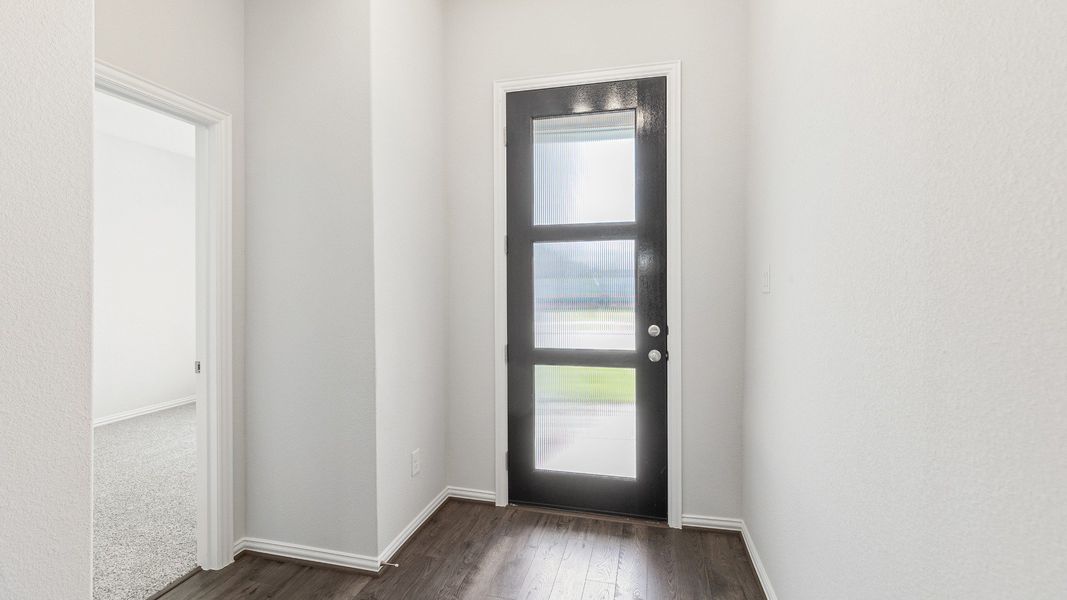 Furnished interior view inside a new home in Sunterra, Katy (Image 8).