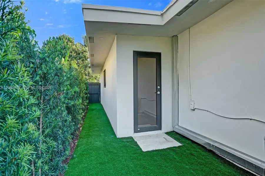 Exterior details and patio area of a home in , North Miami Beach (Image 26).