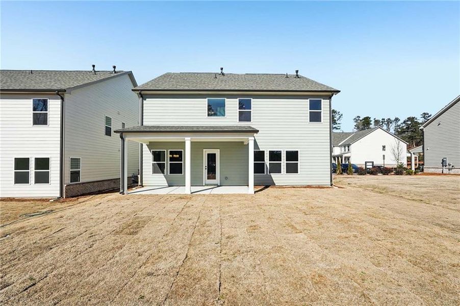 Exterior details and patio area of a home in Arbors at Richland Creek, Buford (Image 26). Exterior details and patio area of a home in Arbors at Richland Creek, Buford (Image 26).