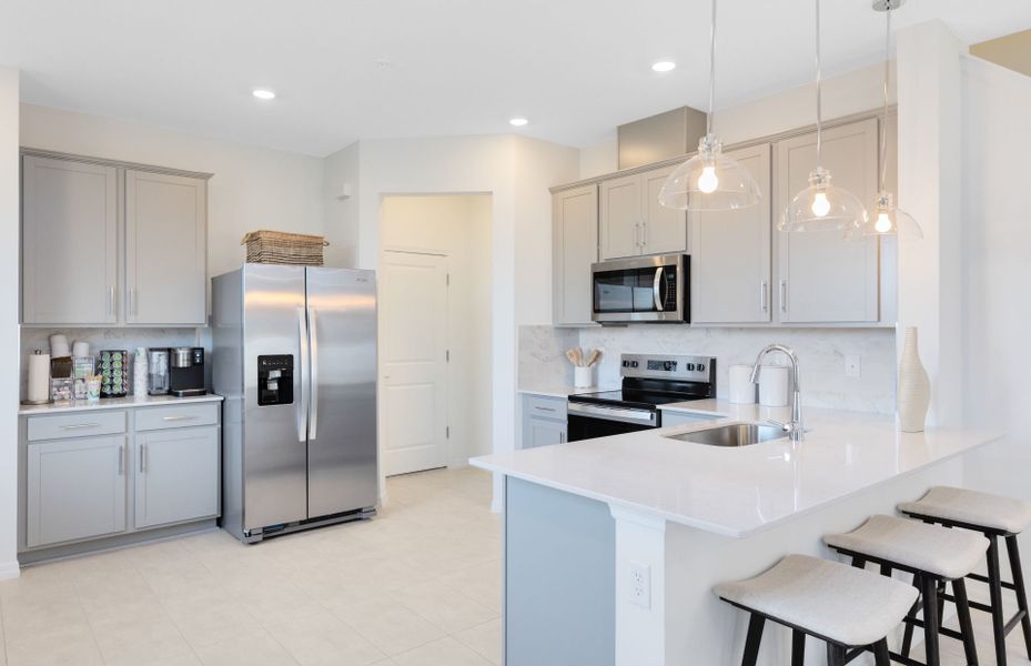 Furnished interior view inside a new home in Harbor Square, Palm Bay (Image 6).