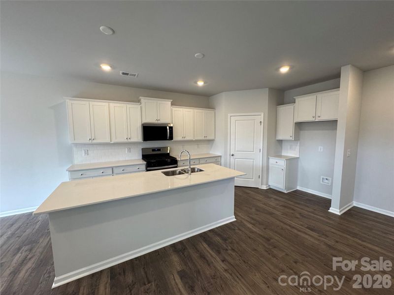 Furnished interior view inside a new home in McFarland Estates, York (Image 5).