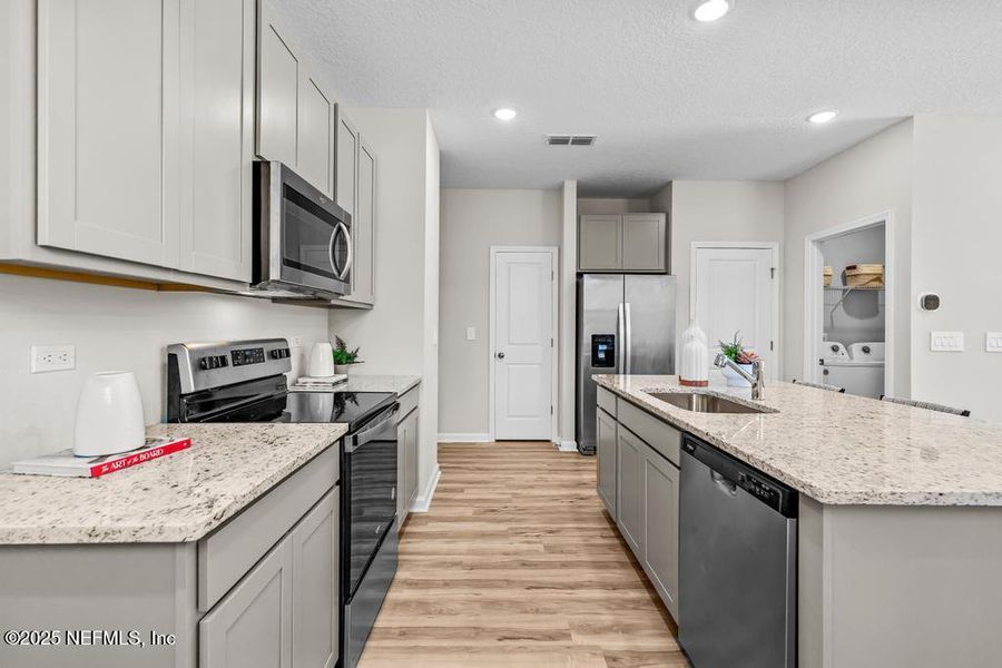 Furnished interior view inside a new home in Palm Series at The Landings at Pecan Park, Jacksonville (Image 3).