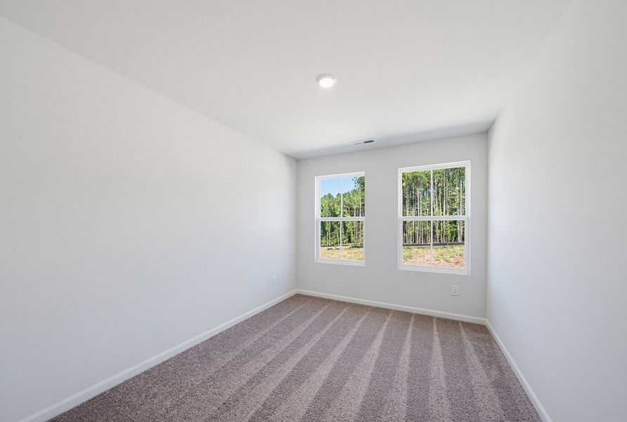 Spacious, unfurnished interior of a new home in Sweetbrier, Durham (Image 23).