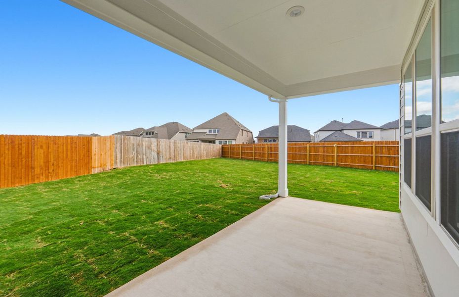 Exterior details and patio area of a home in Santa Rita Ranch, Liberty Hill (Image 4).