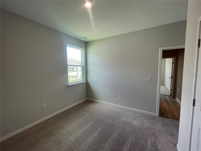 Spacious, unfurnished interior of a new home in Magnolia Series at Seminole Palms, Palm Coast (Image 29).