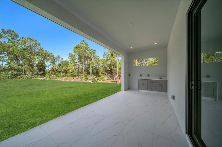 Exterior details and patio area of a home in , Lehigh Acres (Image 3). Exterior details and patio area of a home in , Lehigh Acres (Image 3).