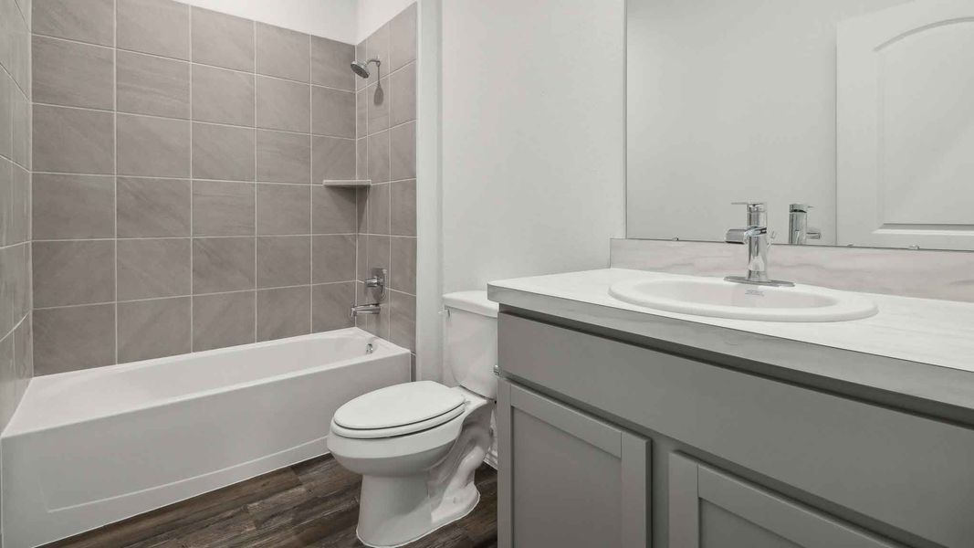 Furnished interior view inside a new home in Grand Pines, Magnolia (Image 9).