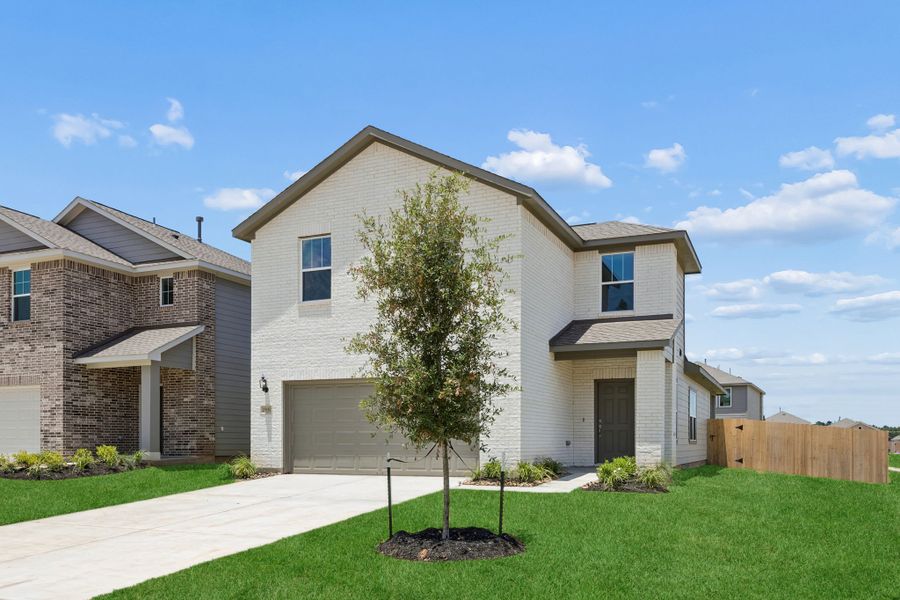 Front exterior of a new home in Magnolia Springs, Montgomery, TX, highlighting curb appeal (Image 2). Front exterior of a new home in Magnolia Springs, Montgomery, TX, highlighting curb appeal (Image 2).