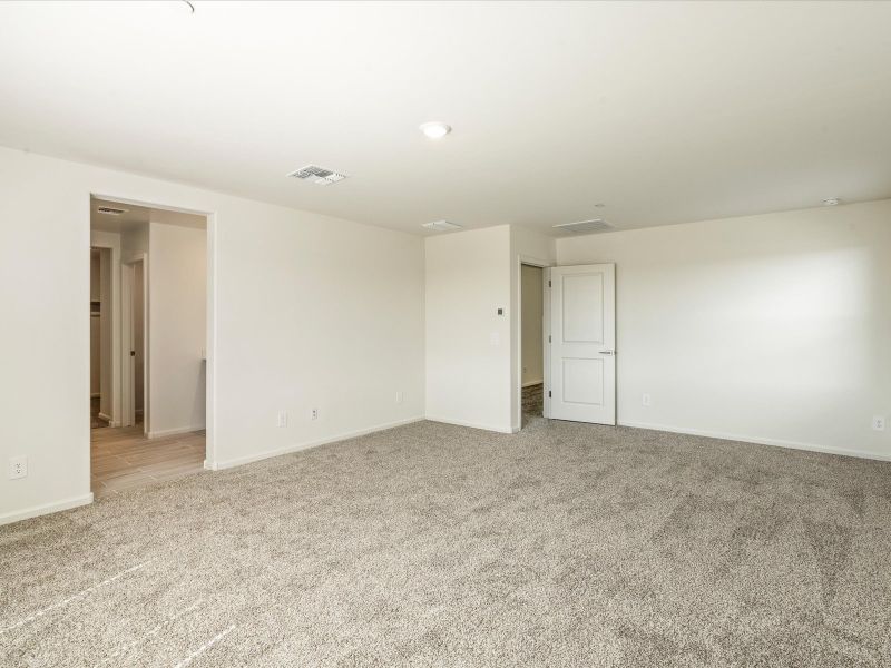 Spacious, unfurnished interior of a new home in Mandarina - Premier Series, Marana (Image 7).