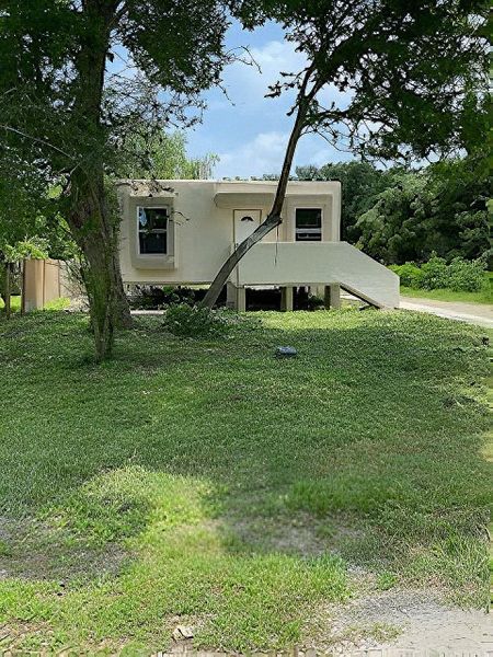 Front exterior of a new home in , Hitchcock, TX, highlighting curb appeal (Image 8).