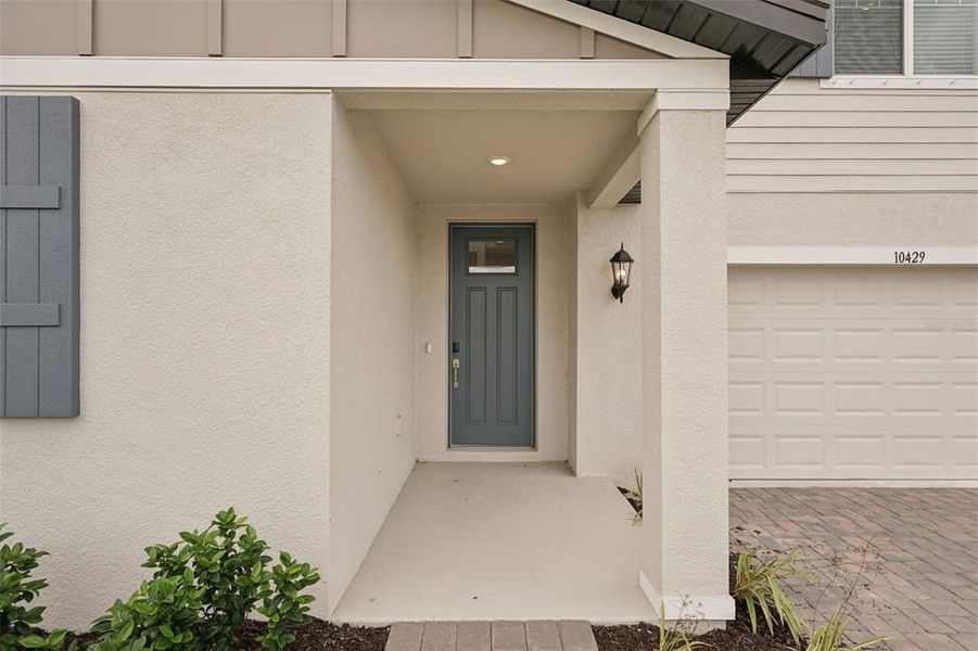 Exterior details and patio area of a home in Oakfield Trails - Classic Series, Parrish (Image 23). Exterior details and patio area of a home in Oakfield Trails - Classic Series, Parrish (Image 23).