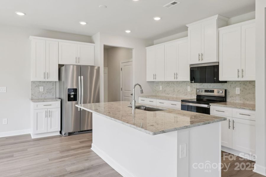 Furnished interior view inside a new home in Harper Landing, Stanley (Image 4). Furnished interior view inside a new home in Harper Landing, Stanley (Image 4).