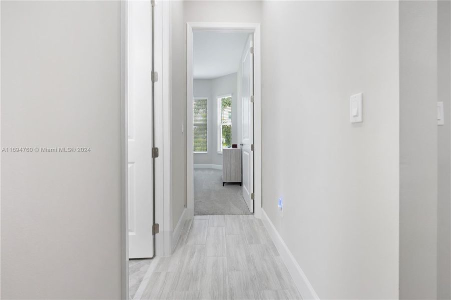 Hallway to guest room and guest bathroom