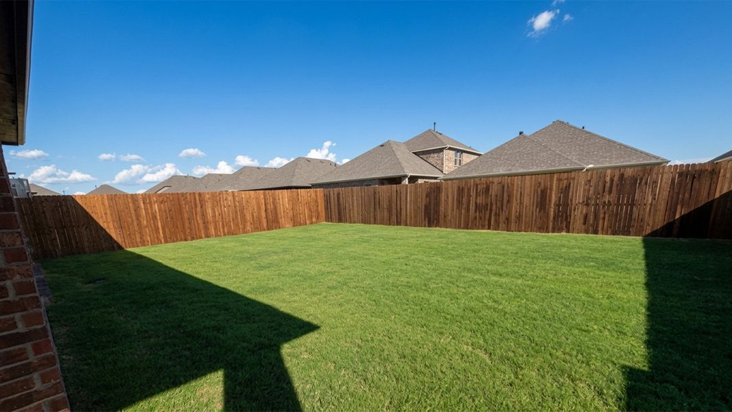 Exterior details and patio area of a home in Lakewood Trails, Forney (Image 3). Exterior details and patio area of a home in Lakewood Trails, Forney (Image 3).