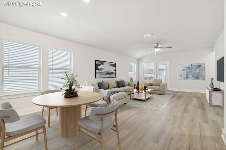 Virtually staged dining room in the Hughes floorplan at a Meritage Homes community.